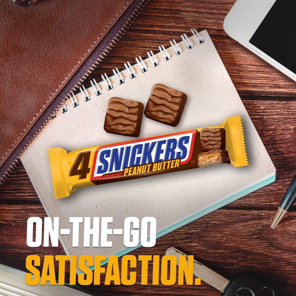 Snickers snack at work, a convenient office treat for hungry moments.