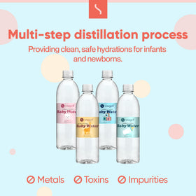 Snugell newborn bottle use with distilled water for feeding routines.
