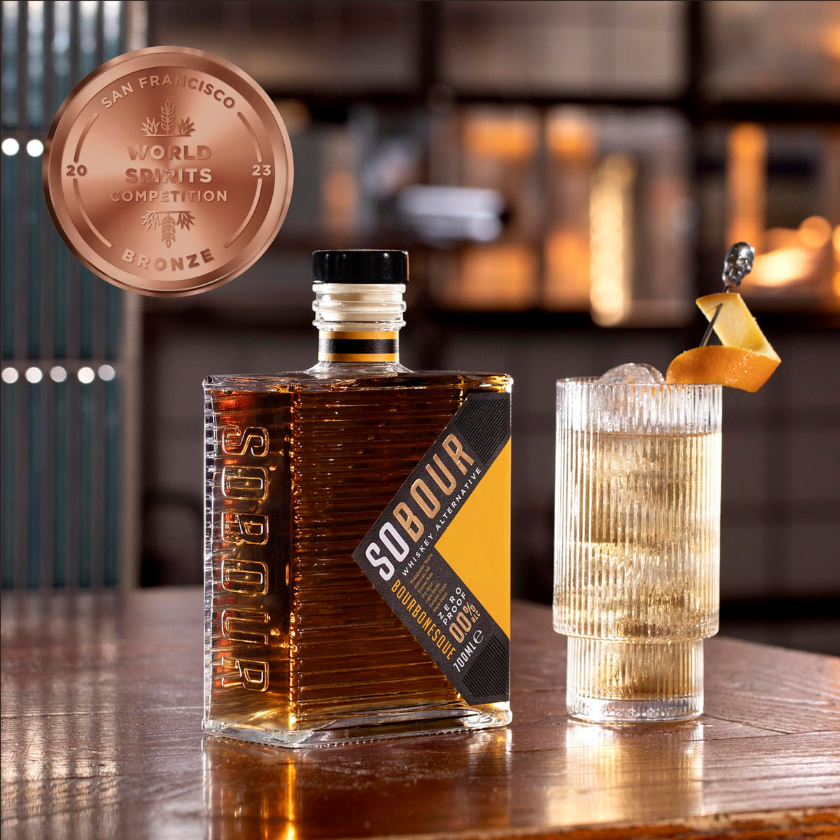 SOBOUR Bourbonesque bottle pour invites elegant, alcohol-free toasts at gatherings.