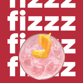 SodaStream bottle and glass with pink grapefruit fizz