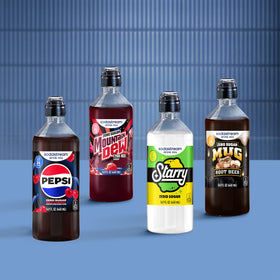 SodaStream kitchen counter setup with sparkling water and flavors.