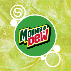 SodaStream Mountain Dew syrup being poured into sparkling water.