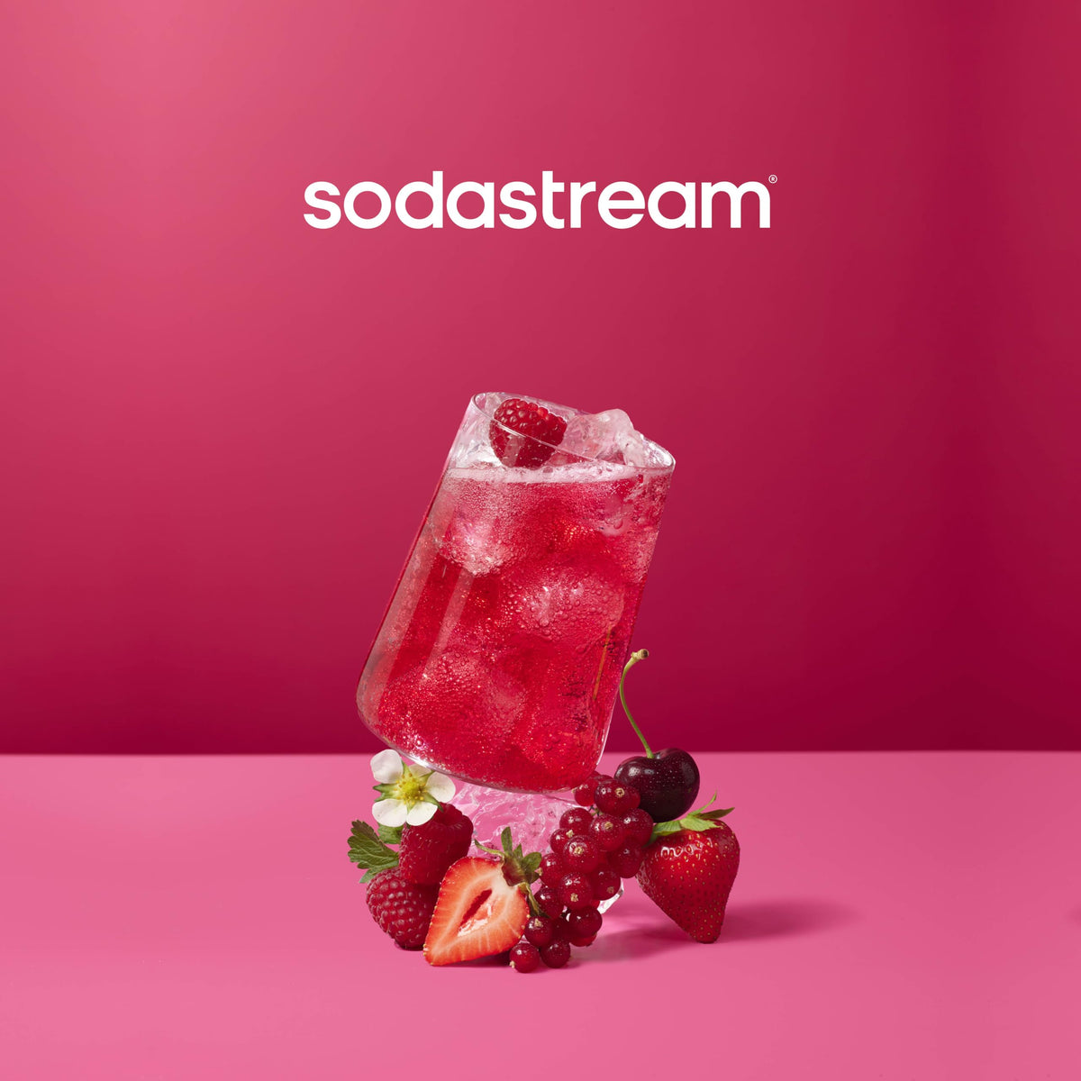 Pouring MTN Dew Code Red into sparkling water for a refreshing cherry twist.