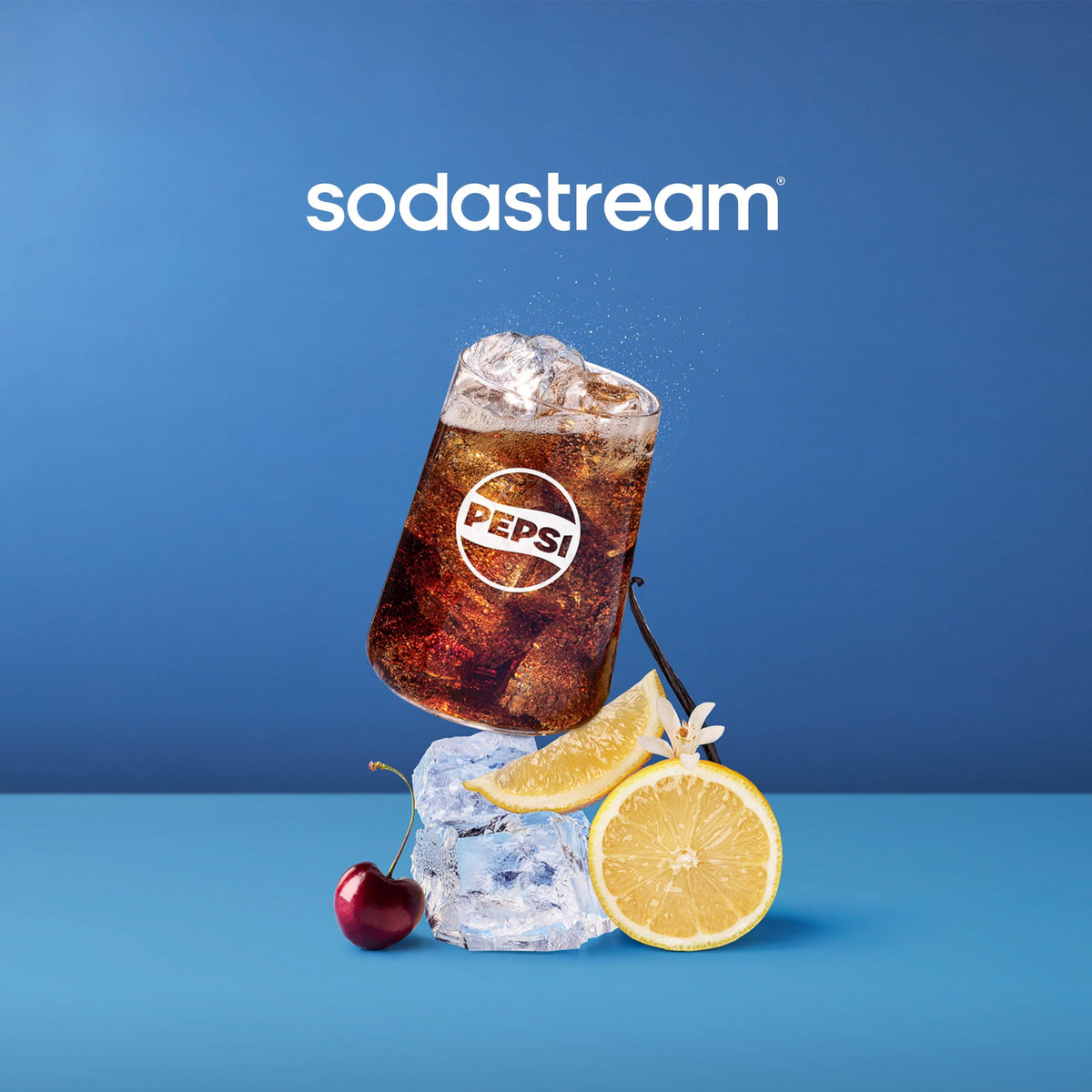 SodaStream Pepsi bottle pouring into a glass, showcasing fresh, personalized cola at home.
