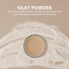 Pouring Soeos Milk Tea Powder into cup for a ready-to-mix beverage