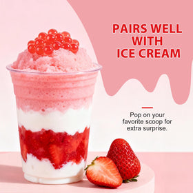 Soeos Strawberry Popping Boba Pearls in cocktail glass for playful garnish