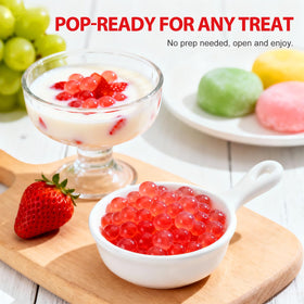Soeos Strawberry Popping Boba Pearls in tea glass for vibrant bubble tea