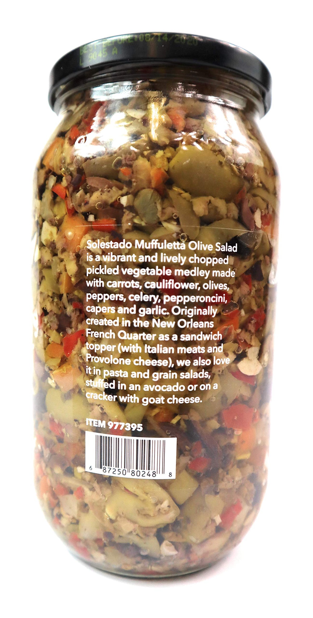 Solestado Muffuletta Olive Salad spread on crusty bread for tasting