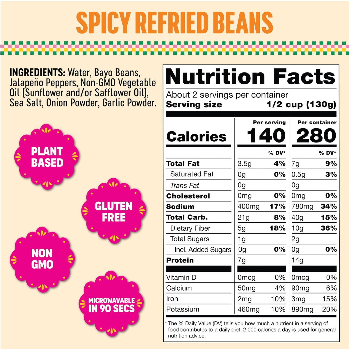 SOMOS spicy refried beans on a plate with tacos, ideal for quick weeknights.