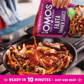 SOMOS sauce serving scene highlighting bold flavor over peppers and steak