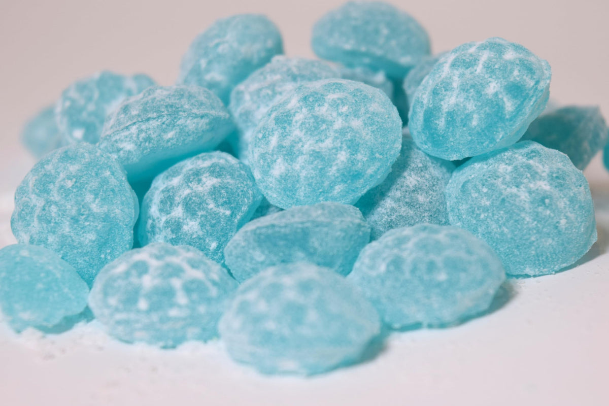 Close-up of Sour Drops coating showcases bold flavor and smooth center.