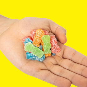 Sour Patch Kids bright colors attract attention in a candy bowl.