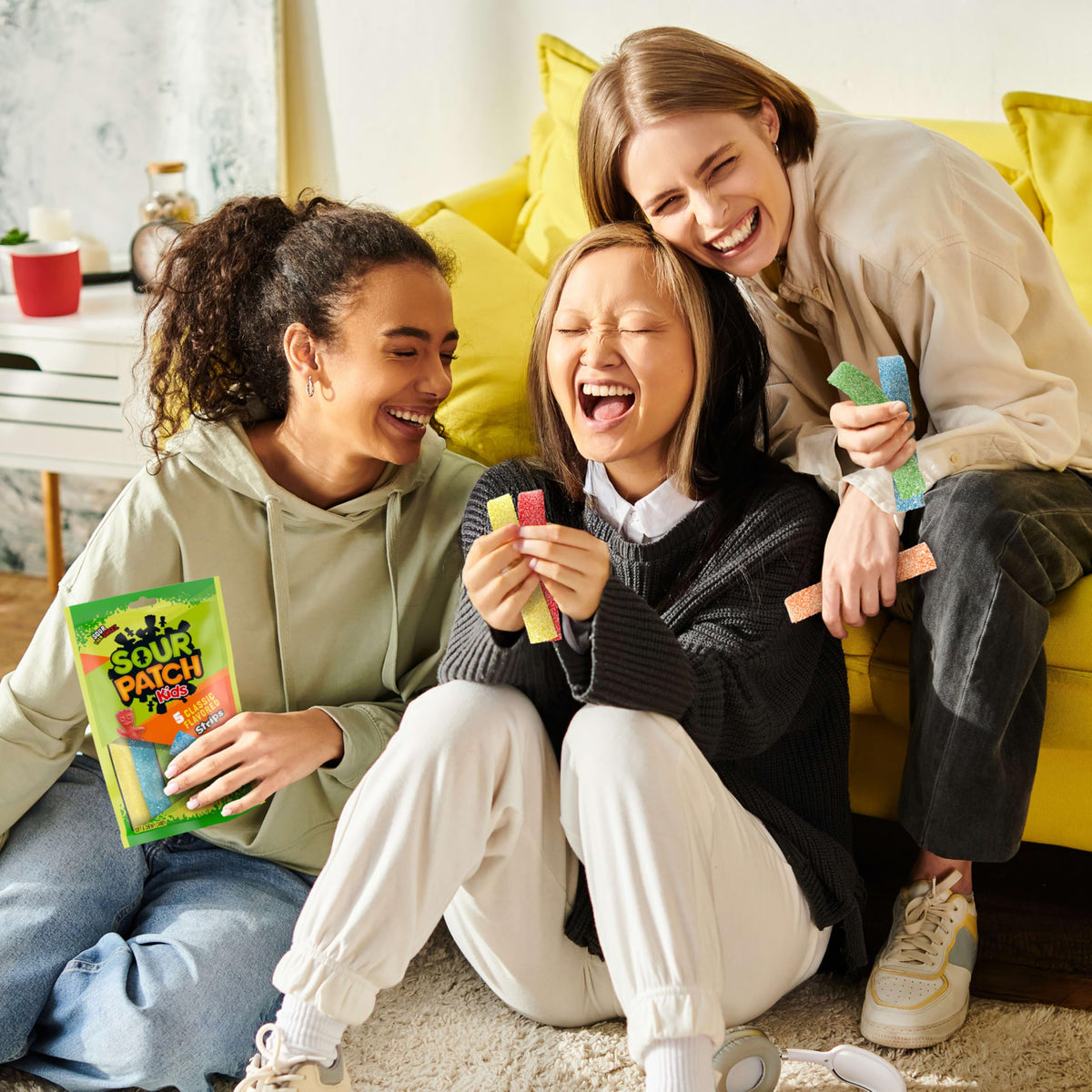 Sour Patch Kids bendable strips inviting playful tearing and sharing