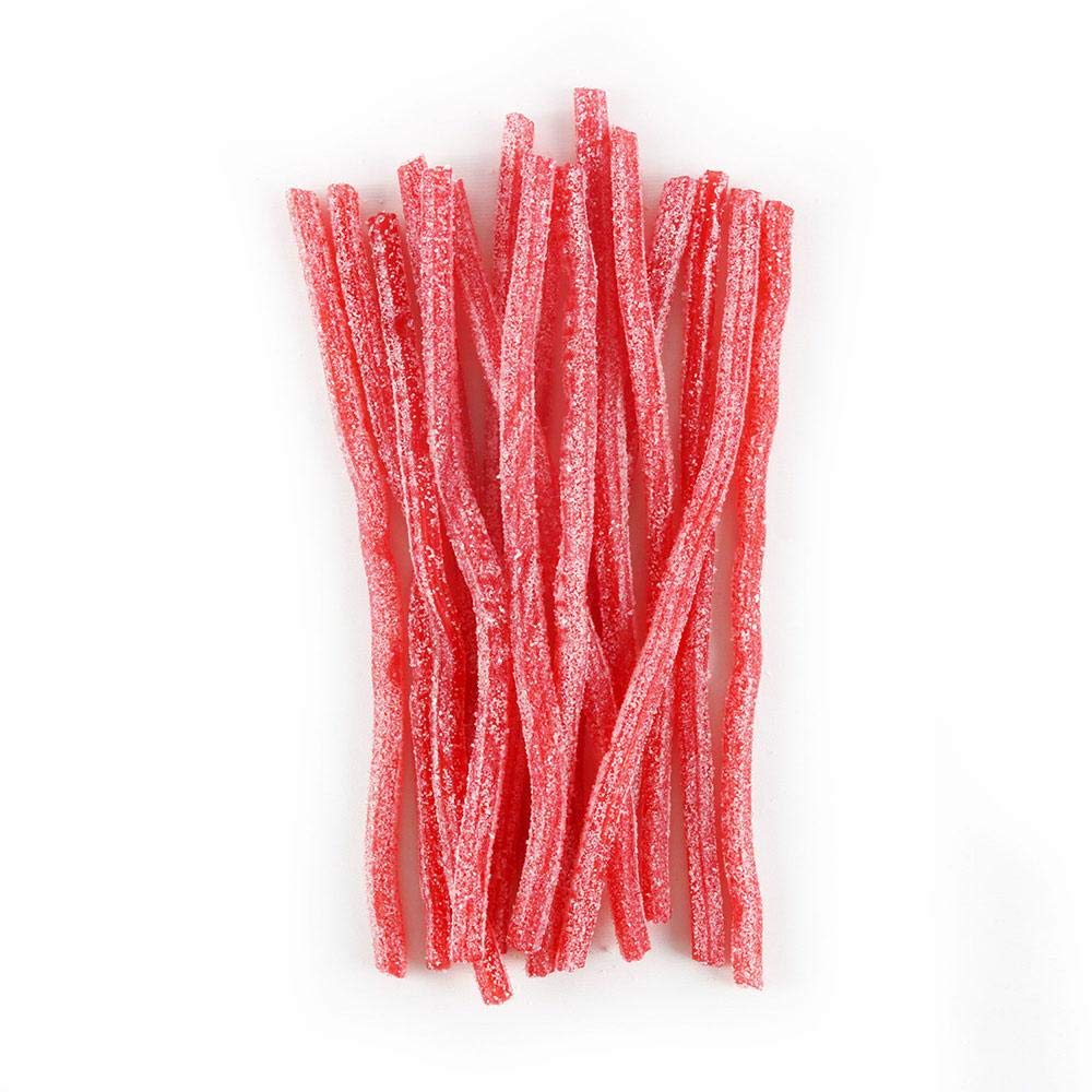 On-the-go Sour Punch snack scene with straw and beverage