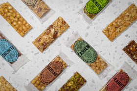 Honey drizzle on a SOUTH FORTY SNACKS bar highlighting natural sweetness.