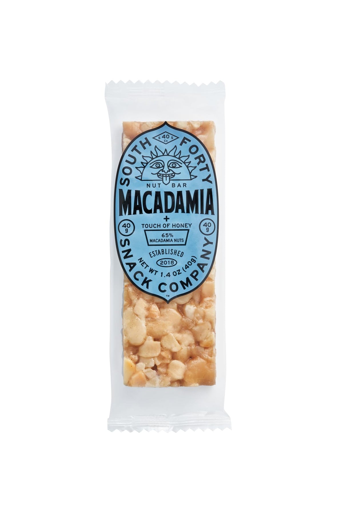South Forty Snacks macadamia nuts closeup reveals kernels and texture of a nut-forward treat.