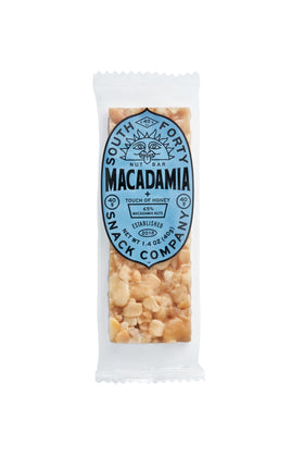 South Forty Snacks macadamia nuts closeup reveals kernels and texture of a nut-forward treat.