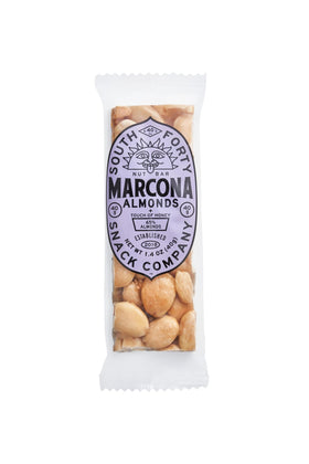 South Forty Snacks marcona almond crunch bar on wood surface, post-workout snack.