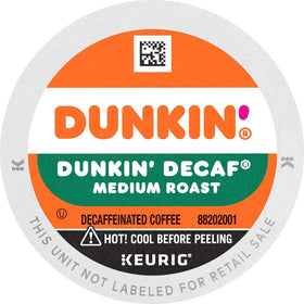 SOUTHERN BASICS Dunkin Donuts Decaf Original K-Cups beside a Keurig brewer demonstrate quick, mess-free brewing.