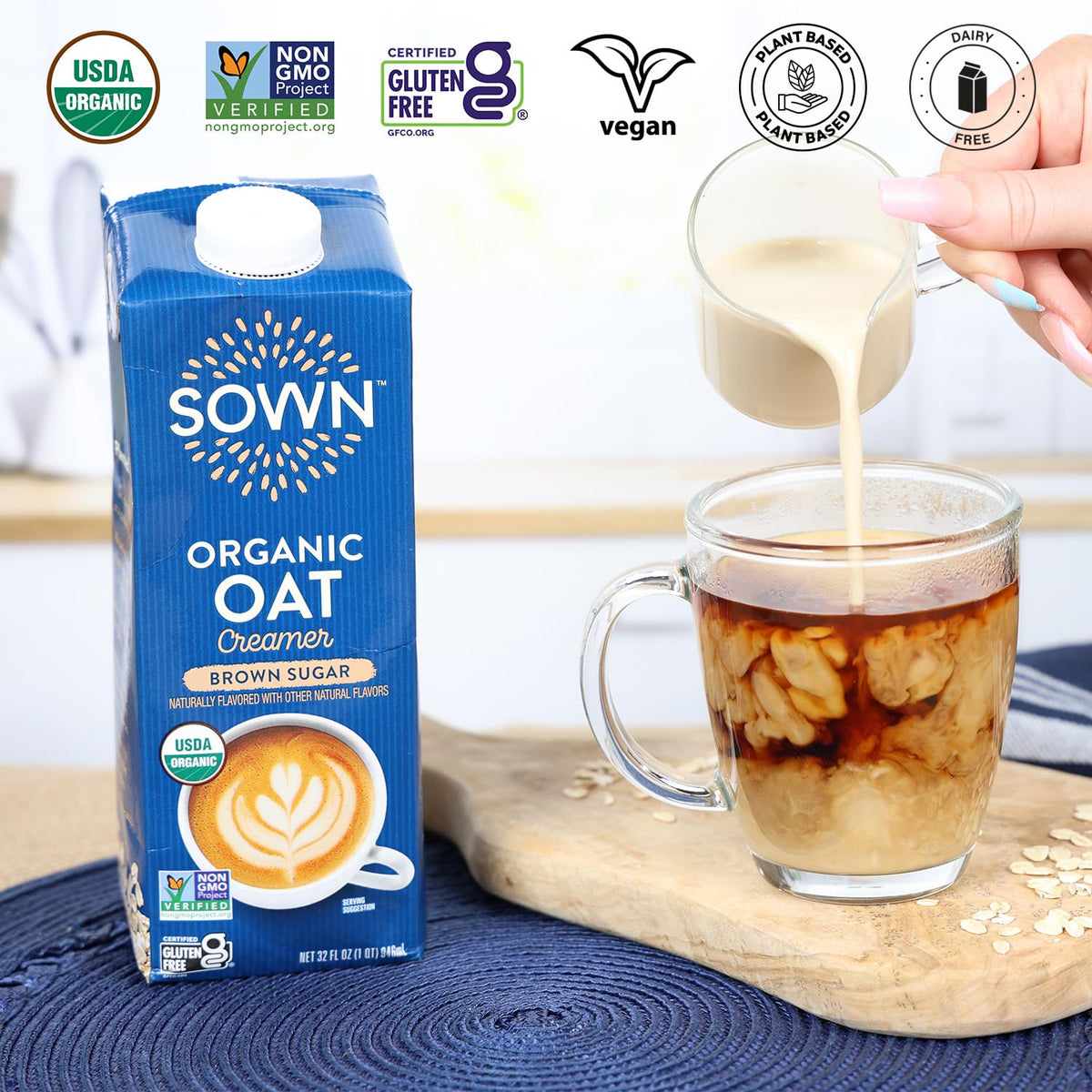 SOWN Coffee cup with creamer showing creamy swirl and comfort.