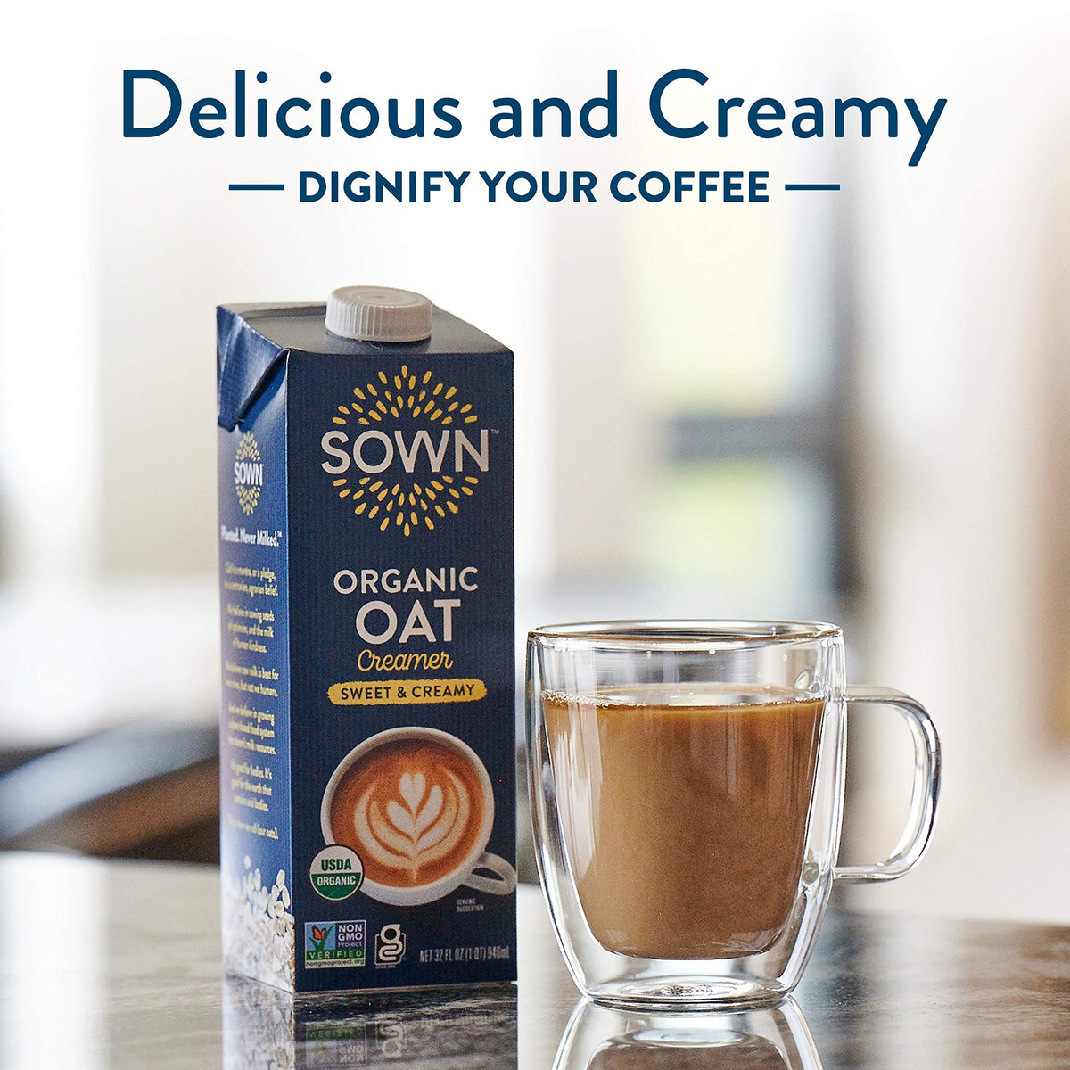SOWN Organic Oat Creamer pouring into a mug with steam, highlighting creamy texture
