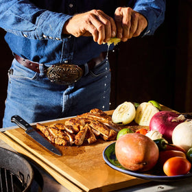 Spanglish Asadero plated dish shows vibrant color and inviting aroma.