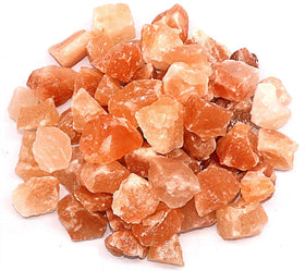 Spantik Himalayan salt chunks closeup showing pink hues, ideal for DIY lamp decor.