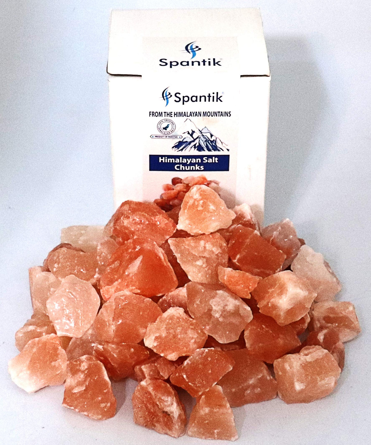 Spantik Himalayan salt chunks stacked as a natural centerpiece.