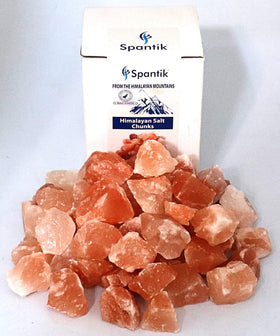 Spantik Himalayan salt chunks stacked as a natural centerpiece.