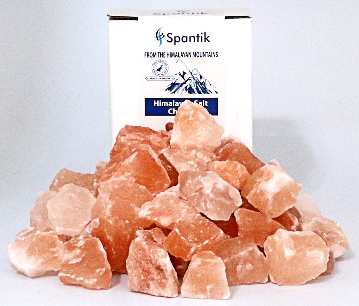 Spantik Himalayan salt chunks in a DIY lamp project with amber glow.