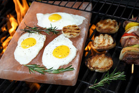 Spantik salt block sliced and served to showcase pink mineral notes