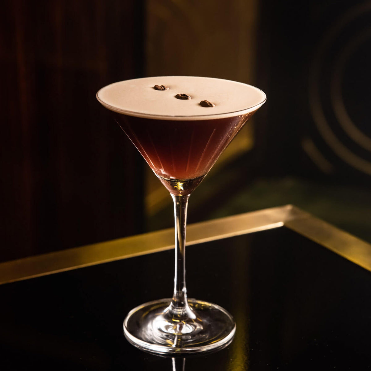Speakeasy Espresso Martini garnish dusting on dessert adds refined flavor hint.