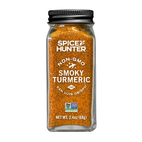 Spice Hunter Smoky Turmeric Rub bottle pour for grilled chicken with smoky depth.