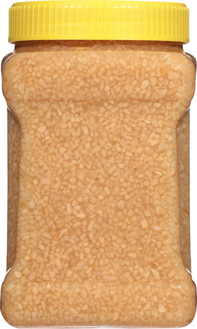 Spice World Minced Garlic label close-up highlights freshness and bulk convenience for cooks.