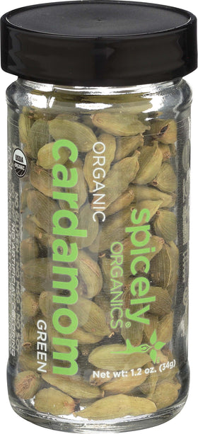 SPICELY Cardamom pods in a green jar, fresh aroma ready to elevate recipes.