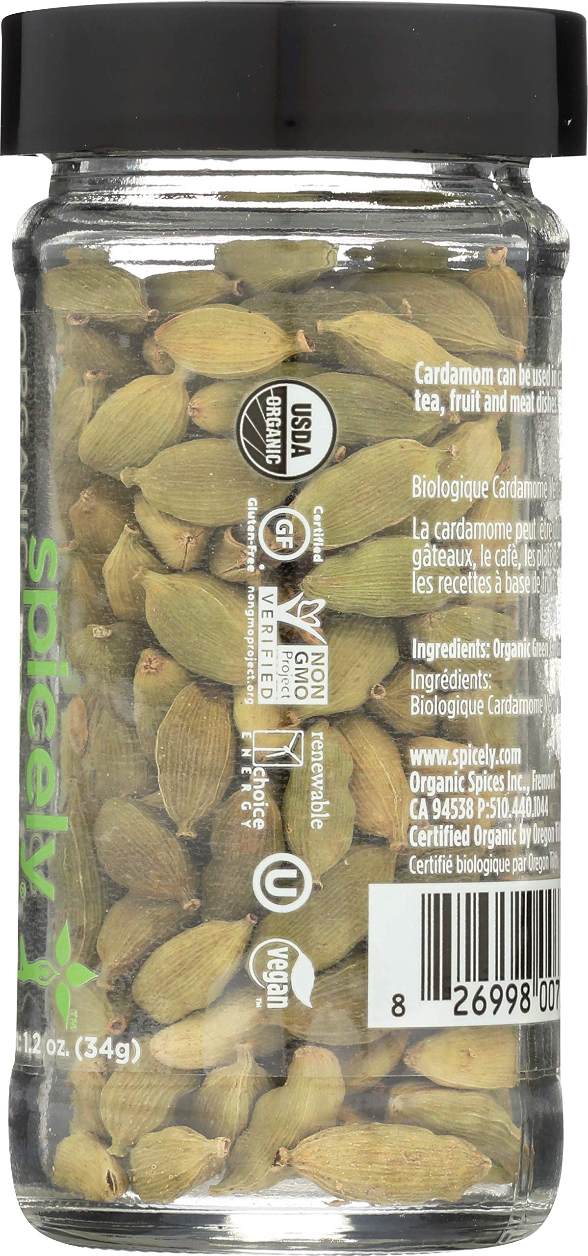 SPICELY Cardamom pods closeup shows vibrant green seeds and plump pods.