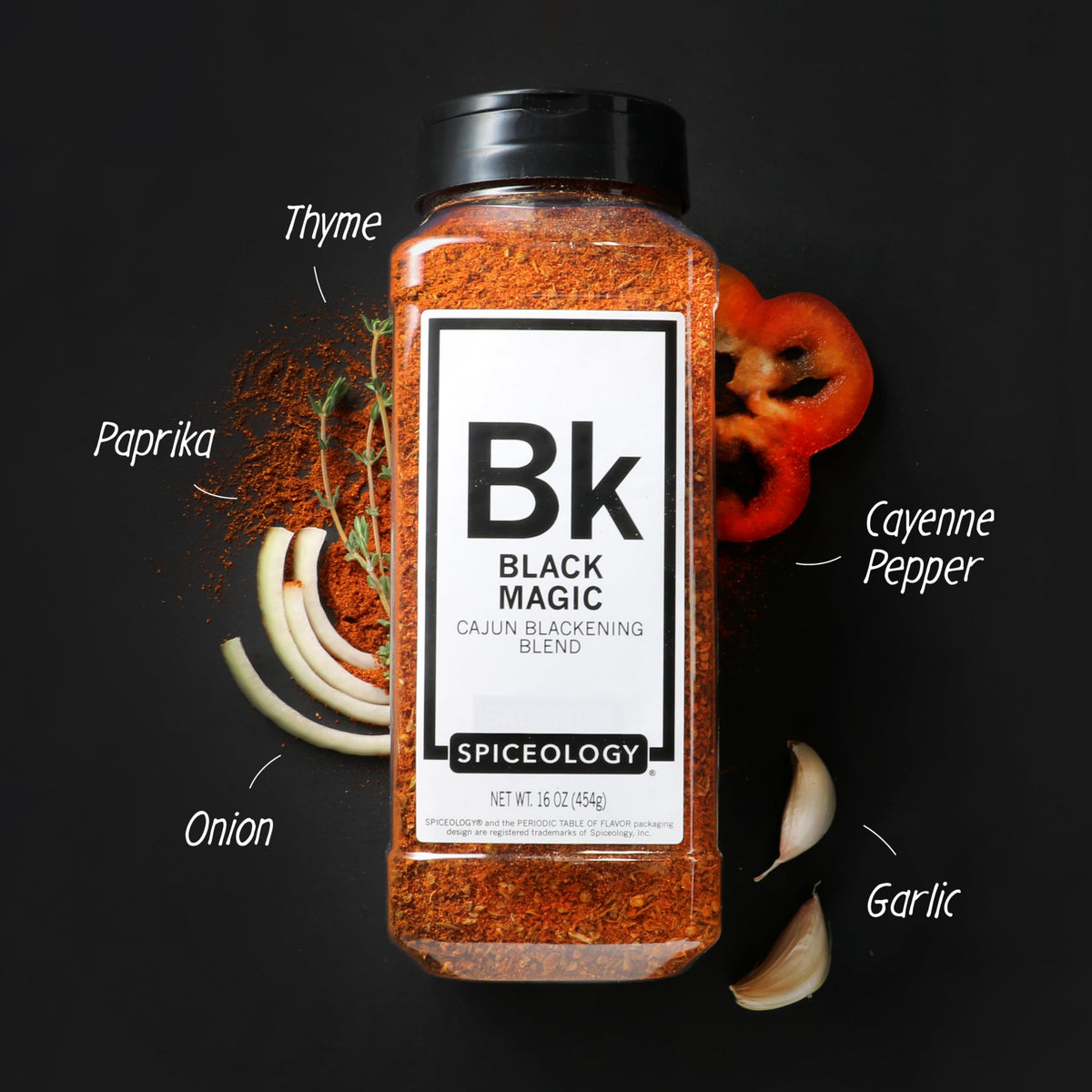Spiceology Black Magic Cajun Blackening Seasoning shaker-top enabling easy application.