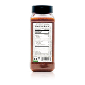 Spiceology El Taco seasoning sprinkled on sizzling fajitas for bold, salt-free flavor.