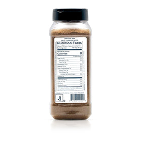 Spiceology Jamaican Jerk Rub shaker ready to season chicken and seafood.