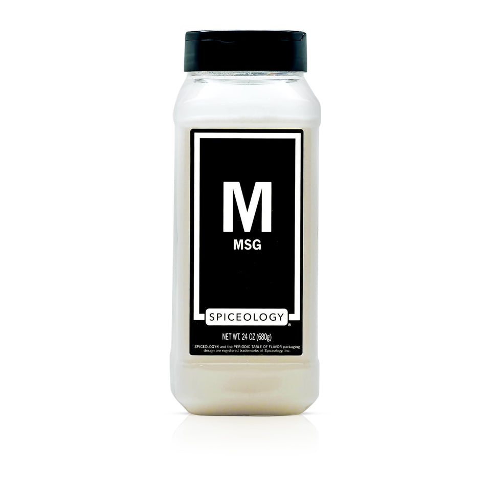 Spiceology MSG bottle being poured to boost umami in recipes