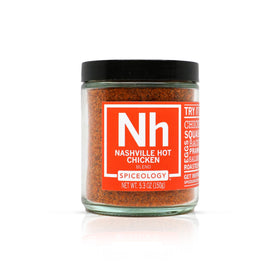 Spiceology Nashville Hot seasoning bottle close-up for bold chicken flavor.