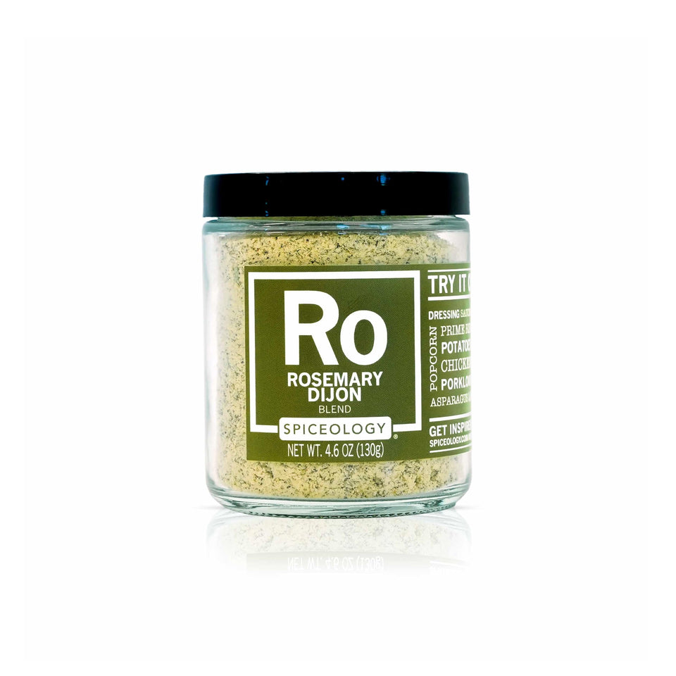 Spiceology Rosemary Dijon spice blend jar showing fresh herbs for versatile cooking.