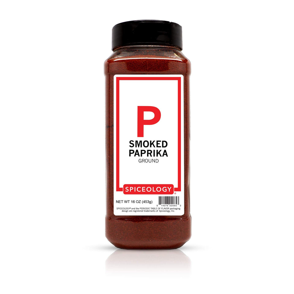 Spiceology Smoked Paprika Powder jar with smoky aroma enhances meats.