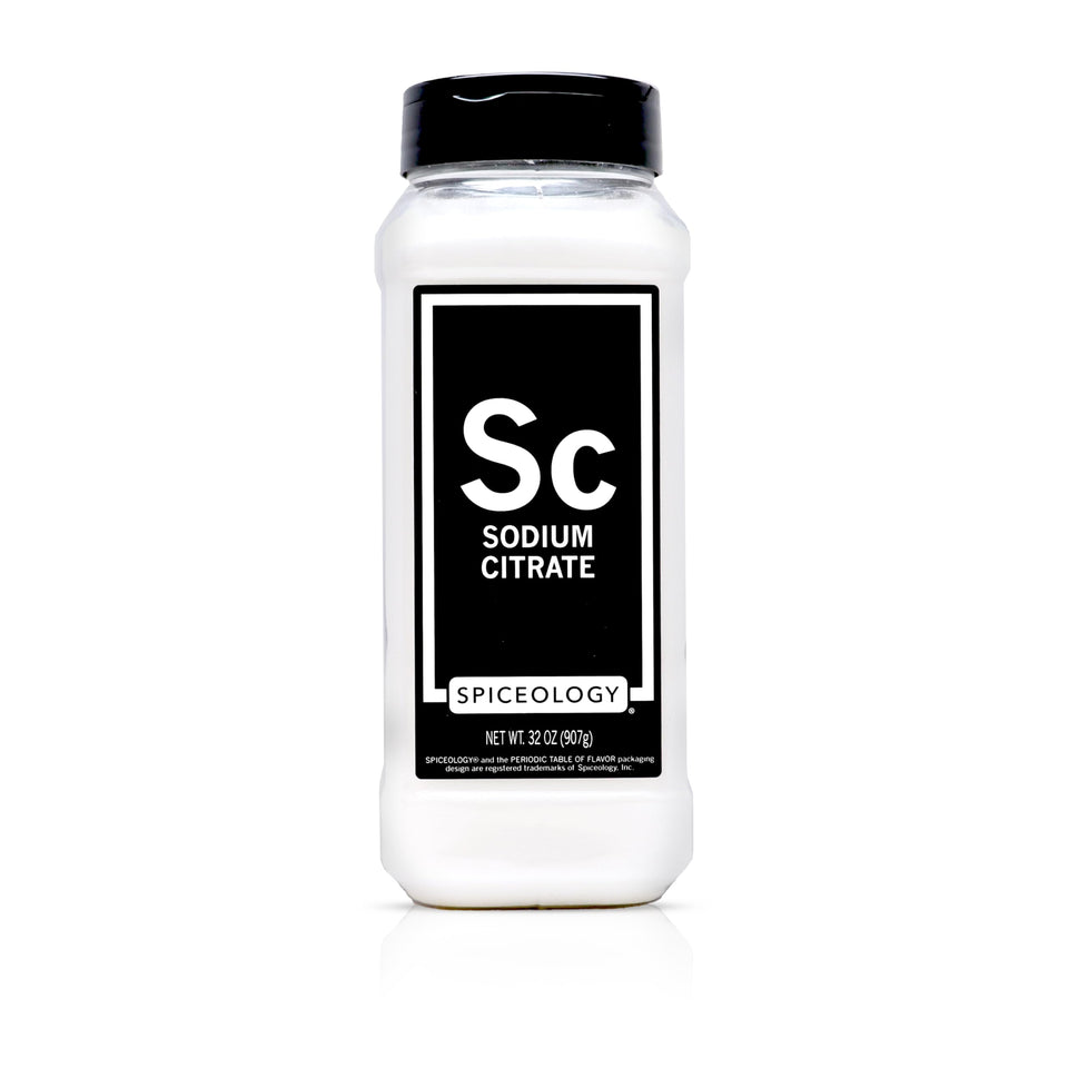 Spiceology Sodium Citrate powder in a jar, ready to emulsify cheese for silky sauces.