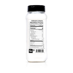 Spiceology Sodium Citrate powder mixing into hot liquid for smooth, clump-free cheese.