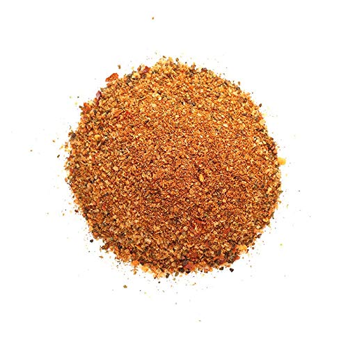 Spiceology Taco Seasoning packaging on shelf emphasizing all-natural, non-irradiated blend