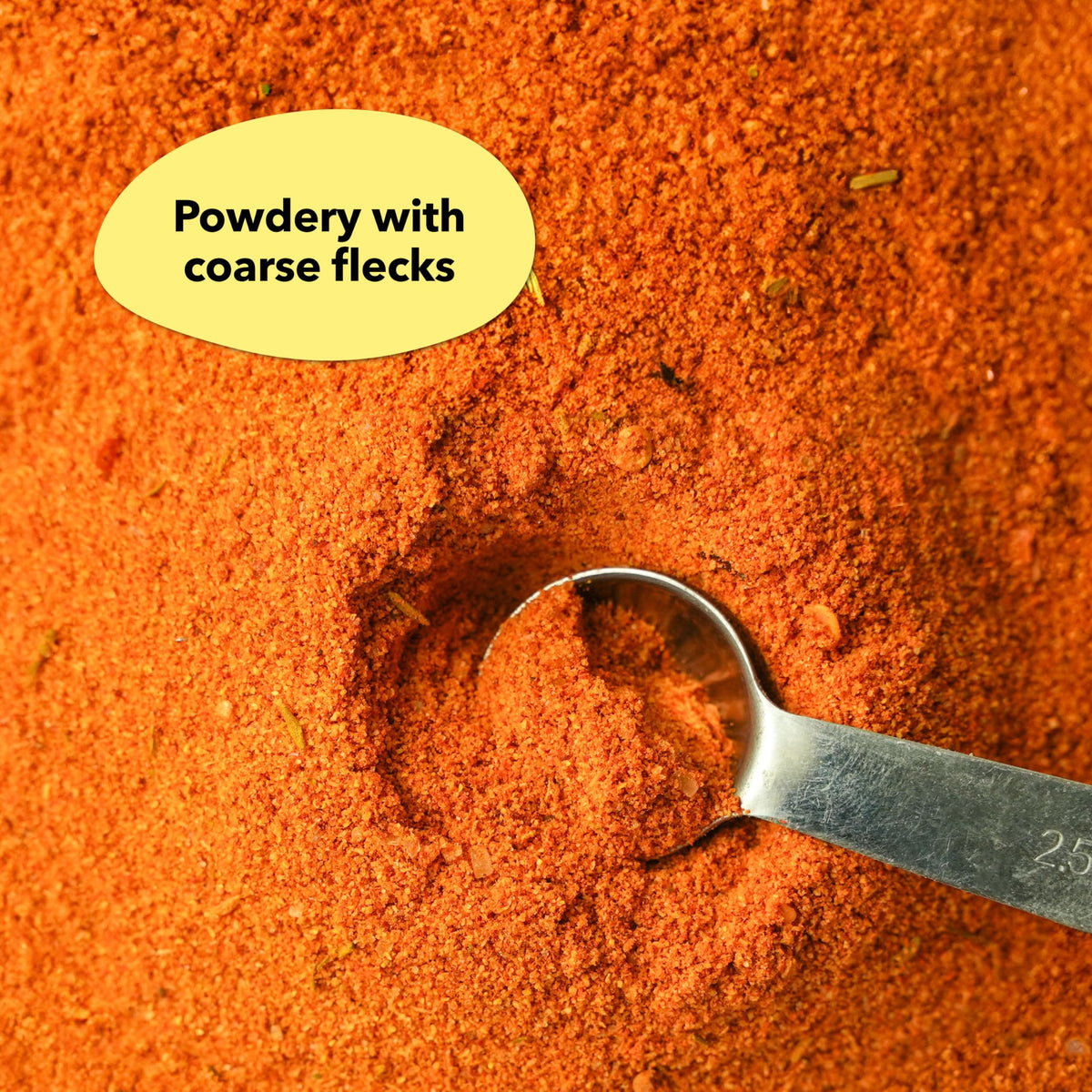 Close-up of Tomatador with paprika and herbs brightening a dish.