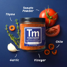 Tomatador spice pour over a pan to boost tomato-based sauces.