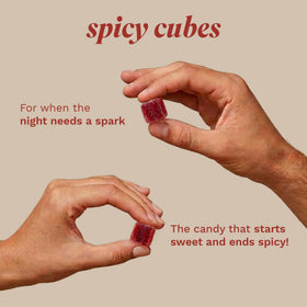 Spicy Cubes peach gummies coating detail shows spicy-sweet finish.