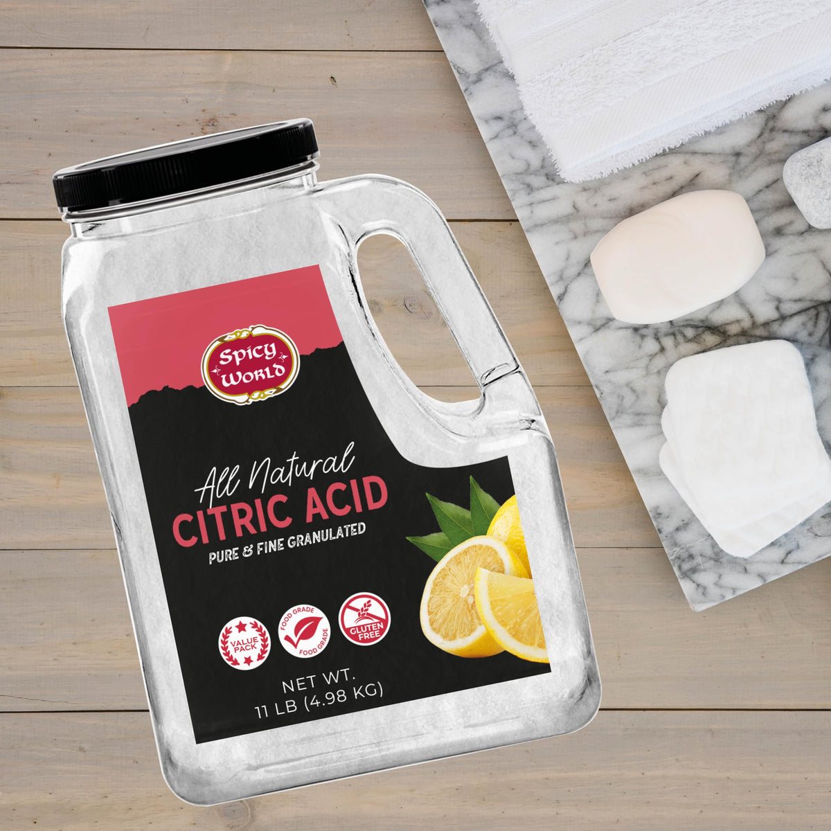 Spicy World citric acid measuring scoop with fine granules for baking.